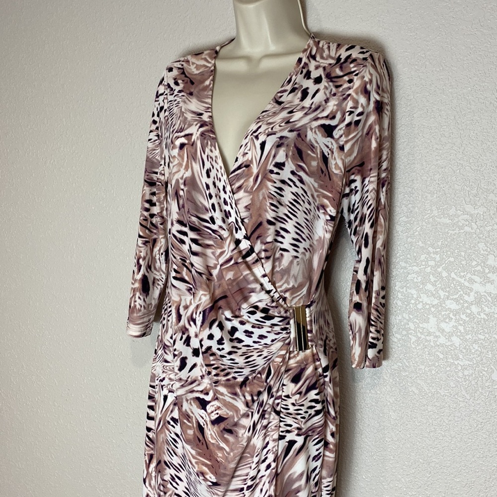 Jennifer Lopez mock midi wrap dress.